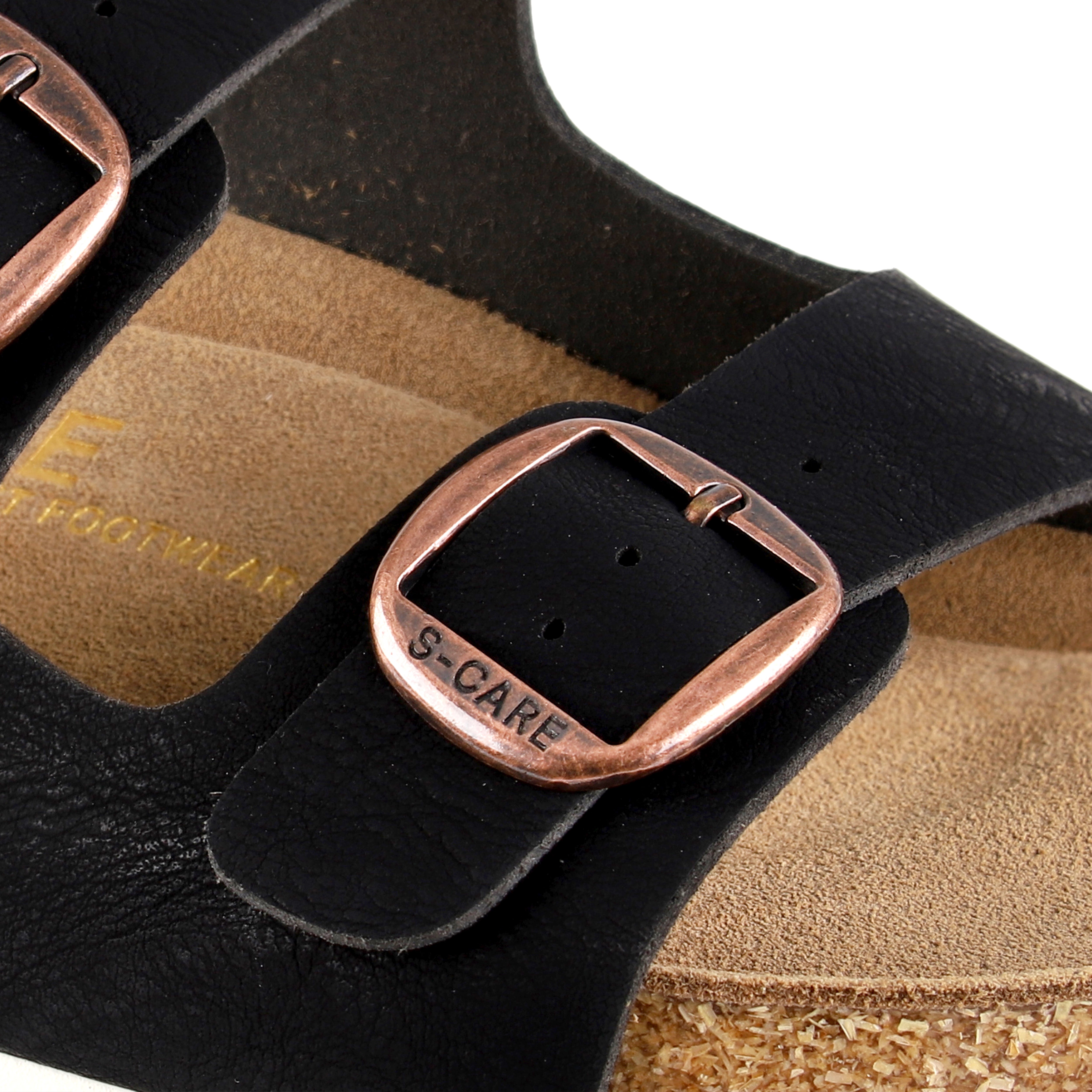 Close-up of S-CARE Bali Sandals in black, capturing the texture of the strap, stitching, and footbed cushion.