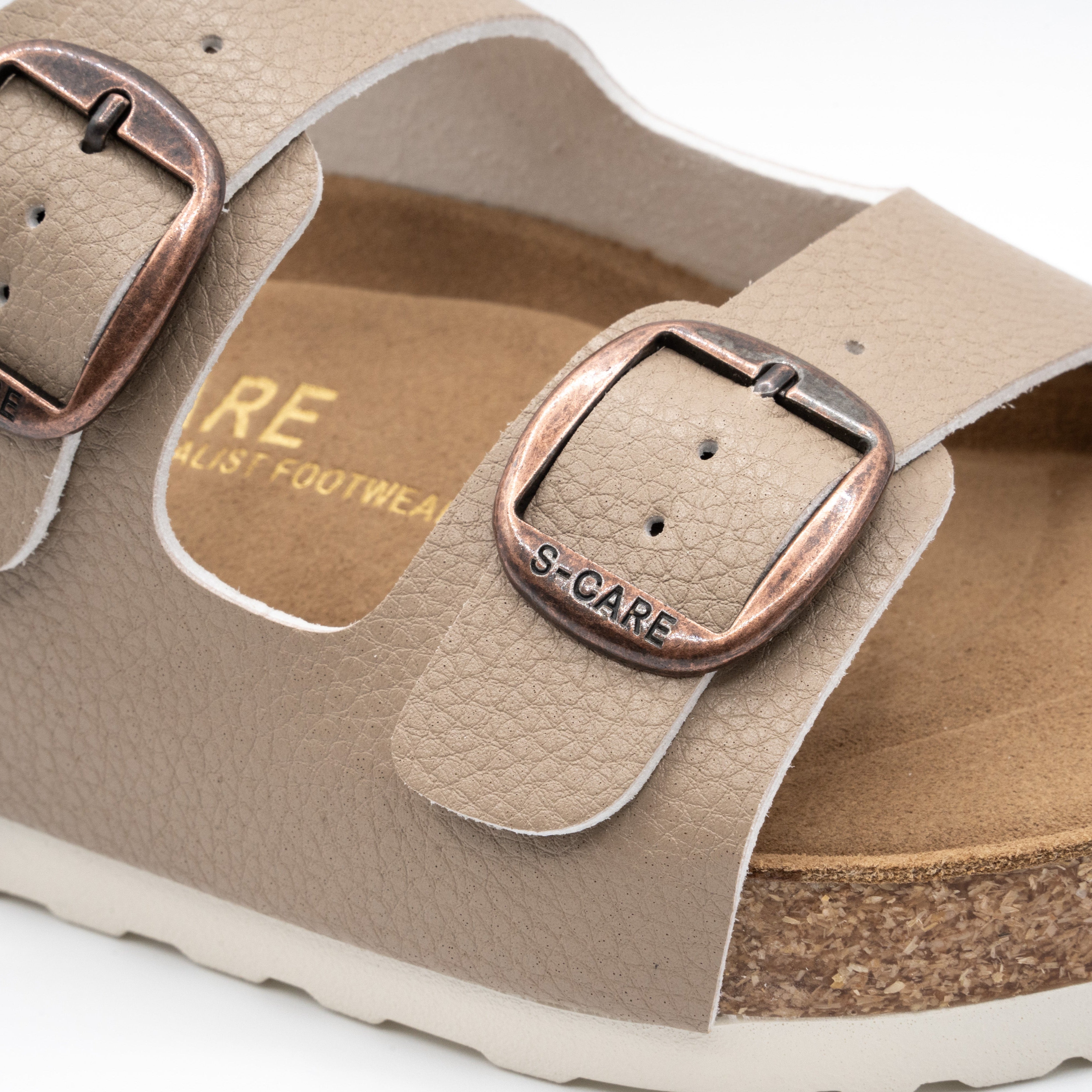 Close-up of S-CARE Doha Sandals in khaki, showing texture details, stitching, and side buckle.