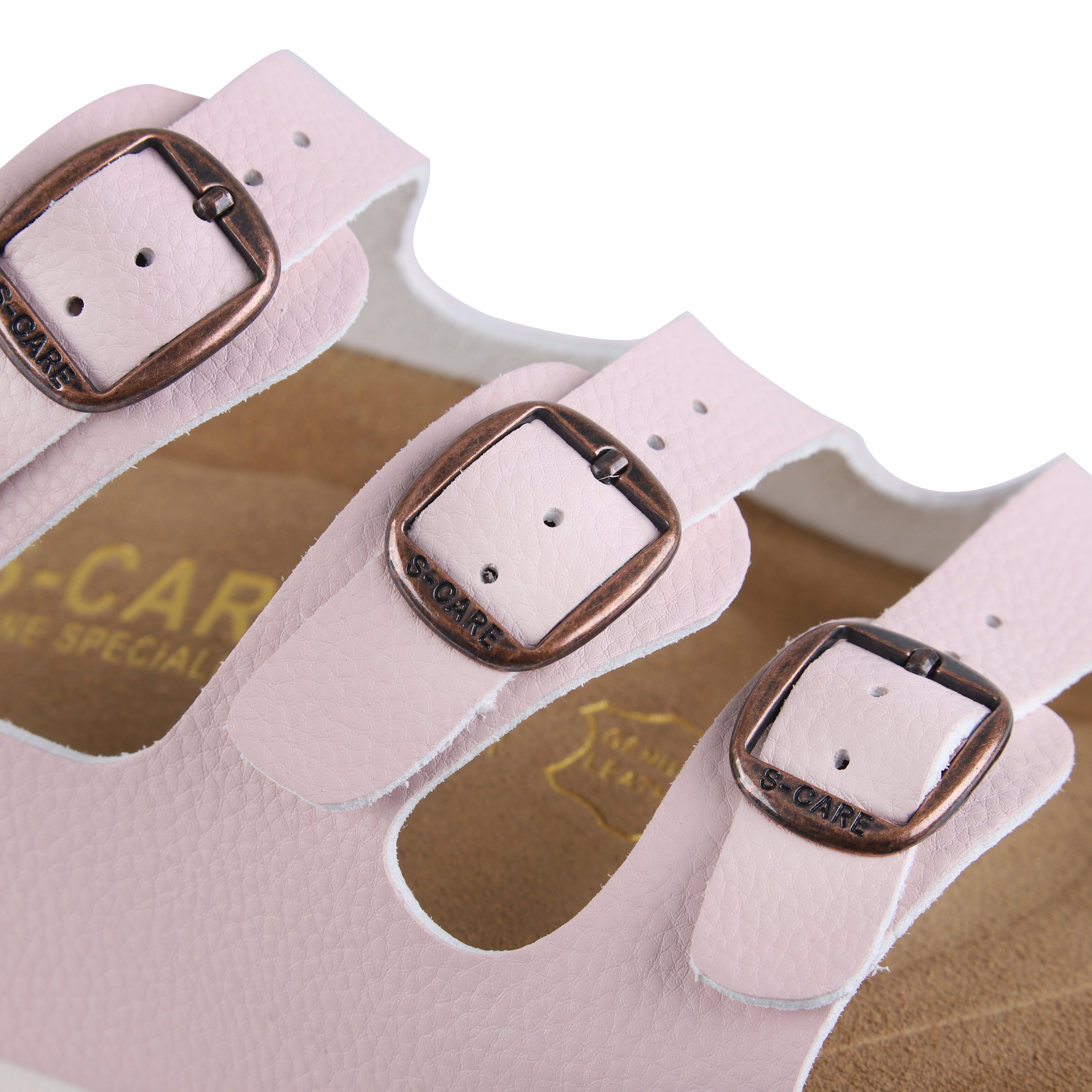 Close-up of S-CARE Muscat Sandals in pink, focusing on texture, buckle, and detailed stitching.