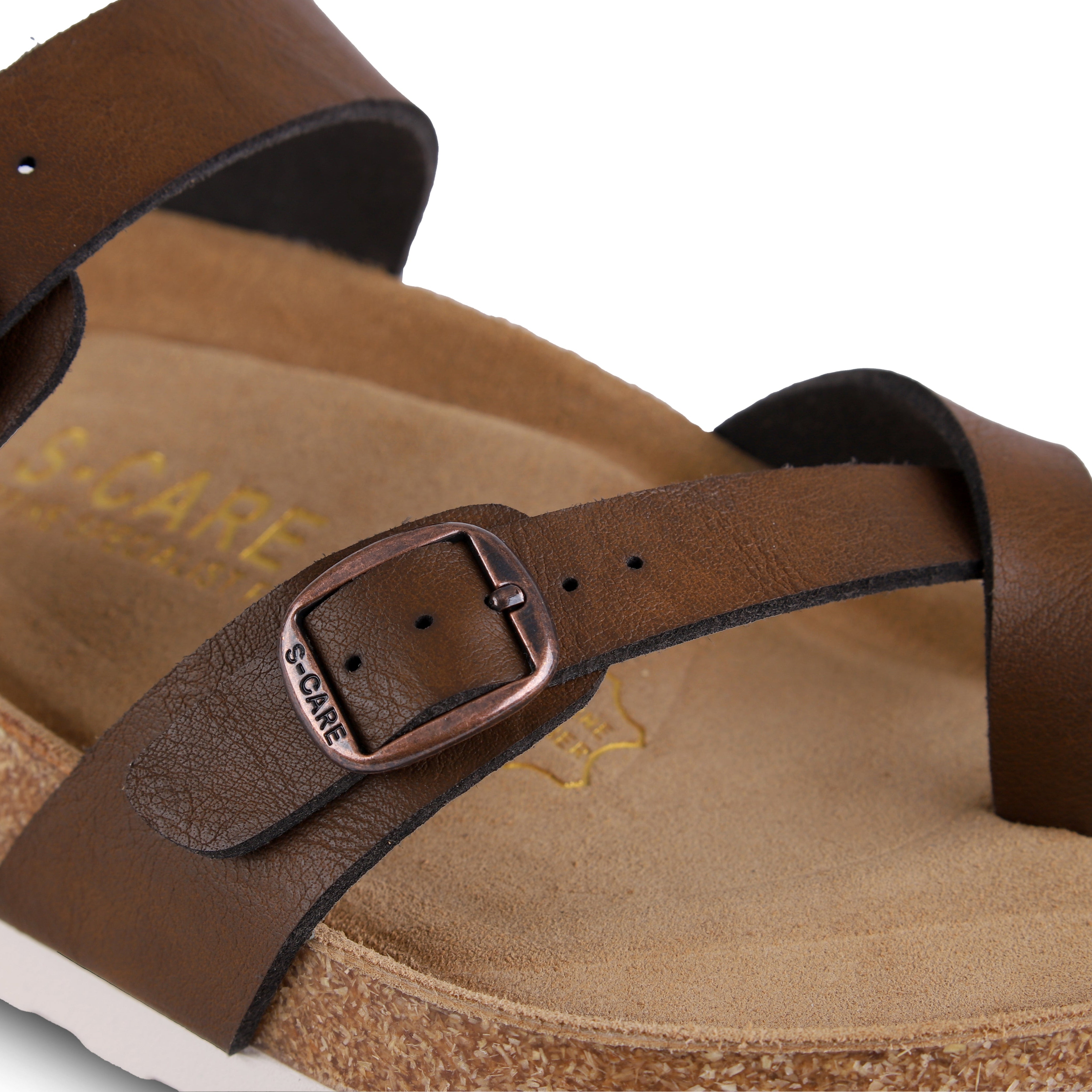 Close-up of S-CARE Riyadh Sandals in brown, capturing the natural finish and detailed stitching.