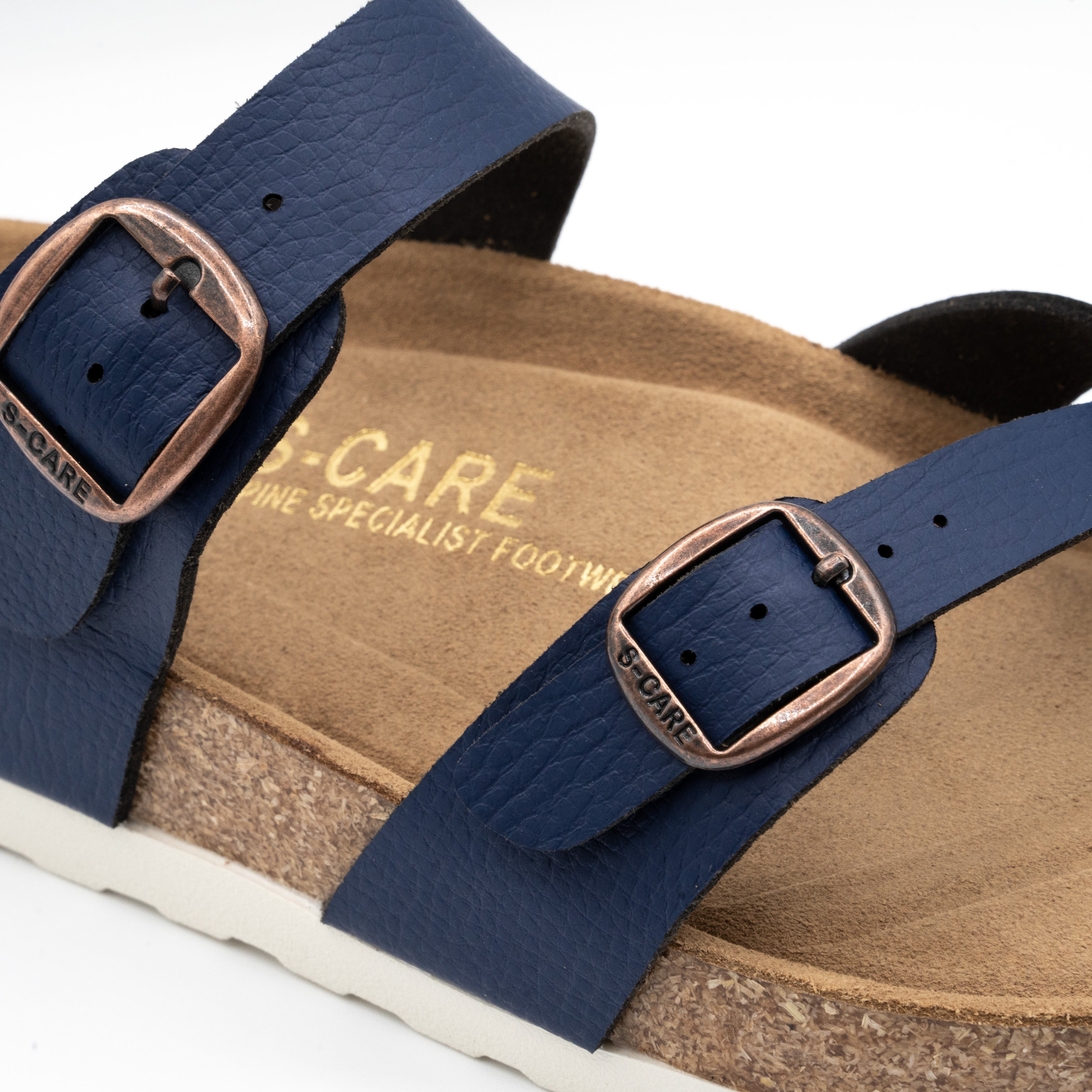 Close-up of S-CARE Riyadh Sandals in navy, showing texture details, stitching, and side buckle.
