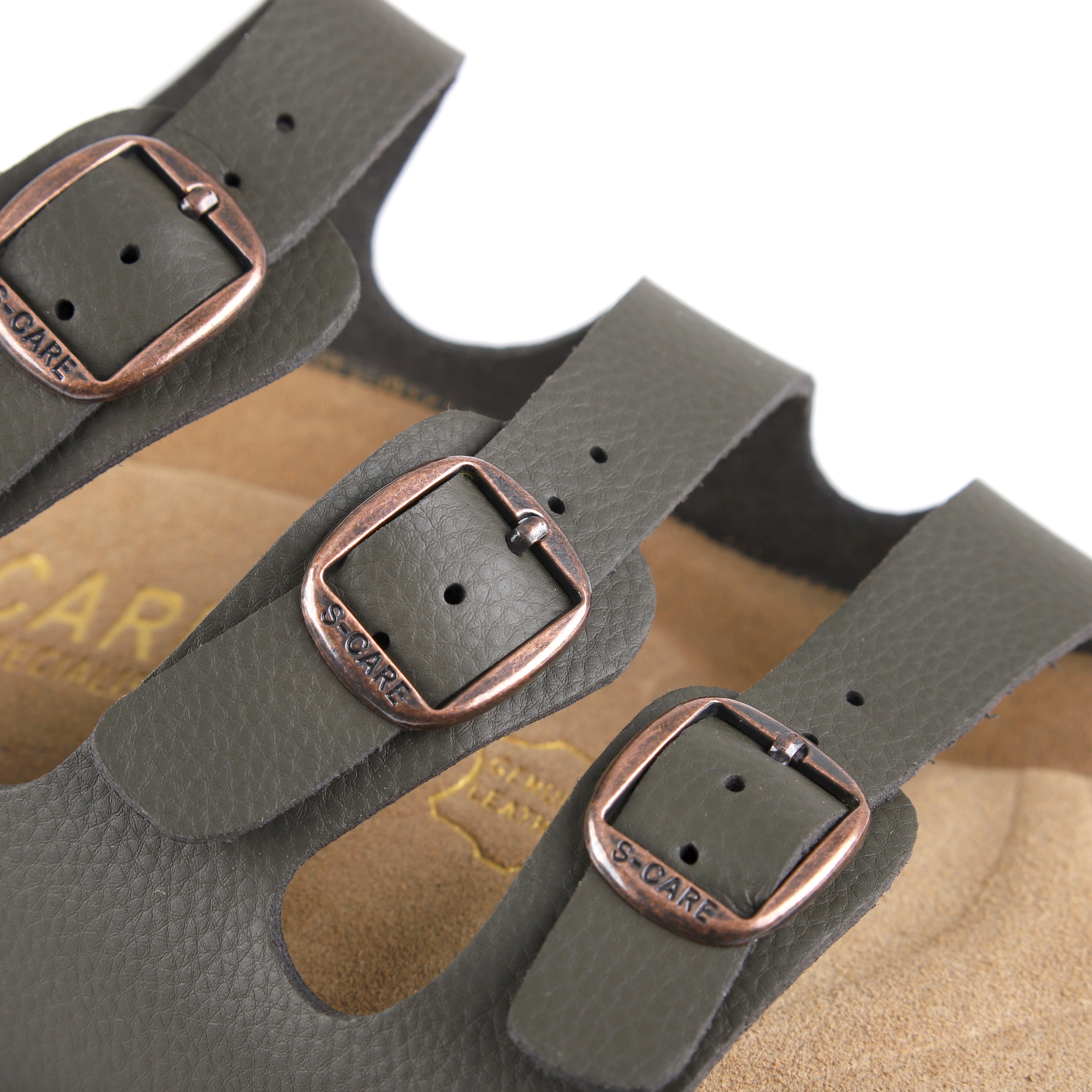 Close-up of S-CARE Muscat Sandals in army green, highlighting stitching, material grain, and cushioning.
